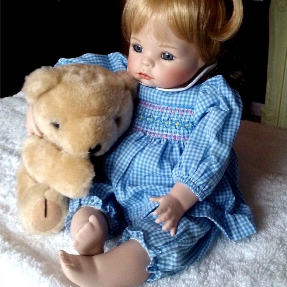 Porcelain doll “Hannah needs a hug” from the Ashton drake collection.